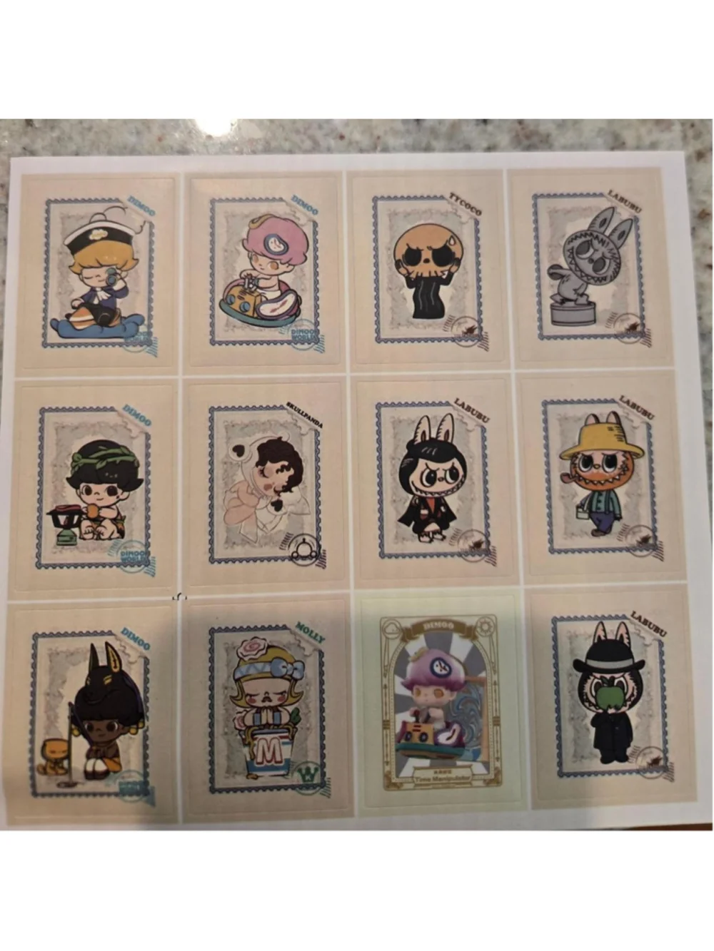 6 sticker sheets that are size 5 in by 5 in - pop mart characters